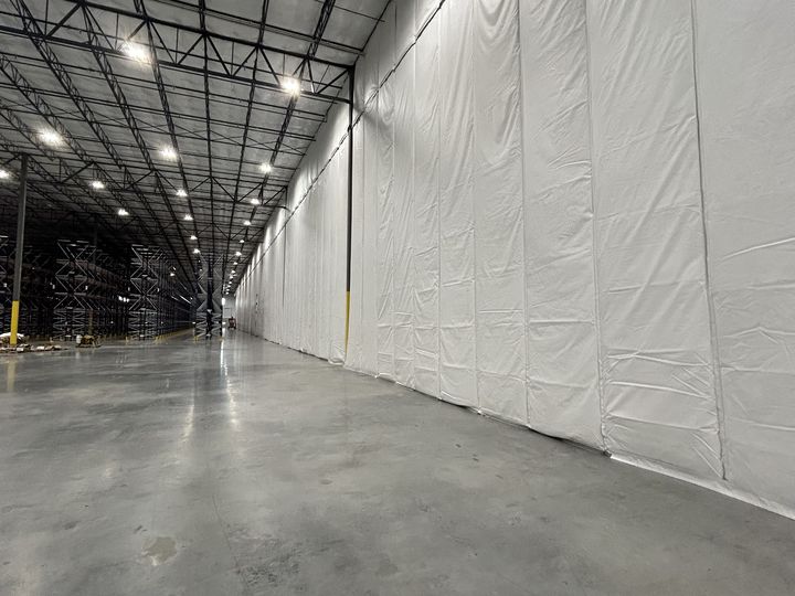 Project Case Studies 1 Insulated Demising Curtain Running The Length Of A Fort Worth Warehouse